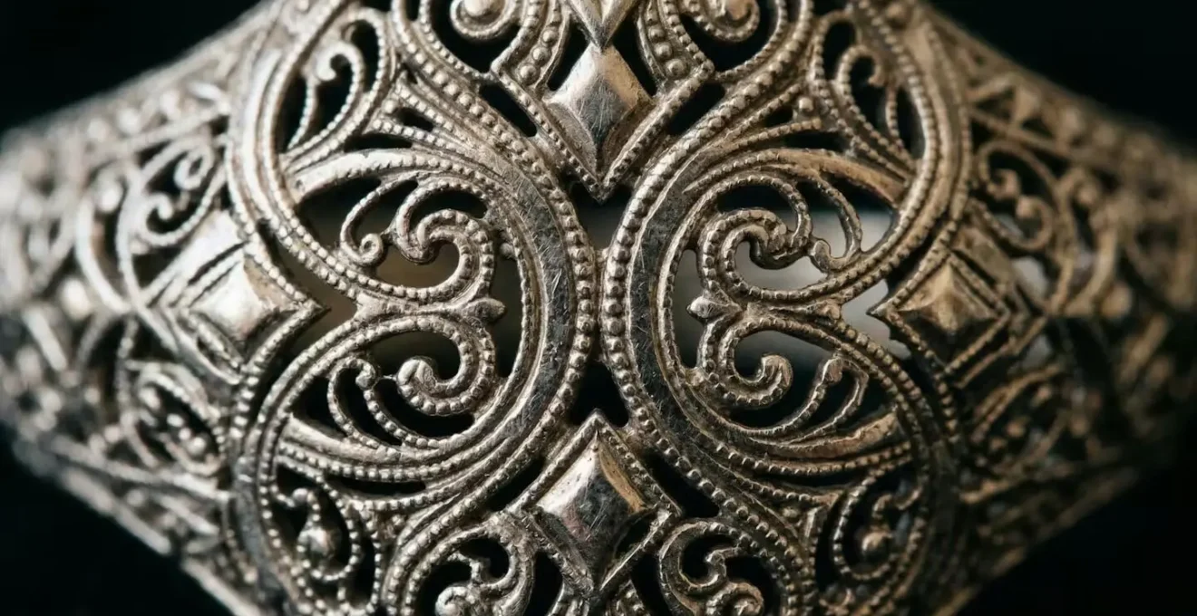 Extreme close-up of Art Deco platinum-iridium jewelry showing hand-fabricated filigree work